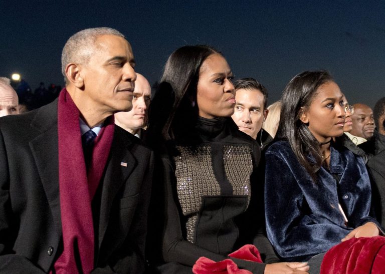 Barack and Michelle Obama share adorable throwback photos of daughter Sasha Obama as they wish her a happy 21st birthday.