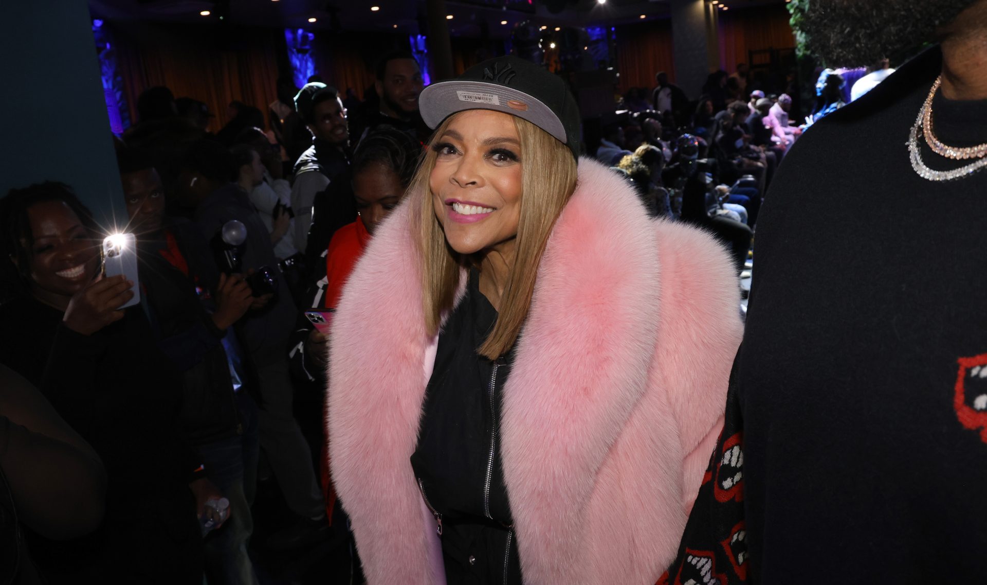 Pretty-In-Pink Fur: Wendy Williams Makes Rare NYFW Appearance, All Smiles After Ex-Husband Loses Alimony Case