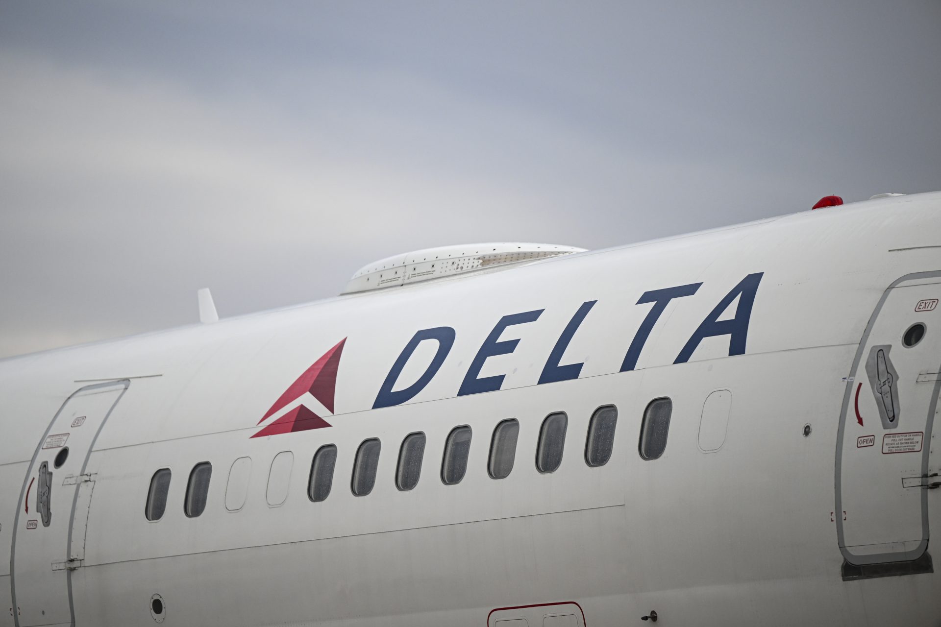 Man Detained At LAX After Reportedly Opening Plane Exit Door & Deploying Exit Slide Before Takeoff