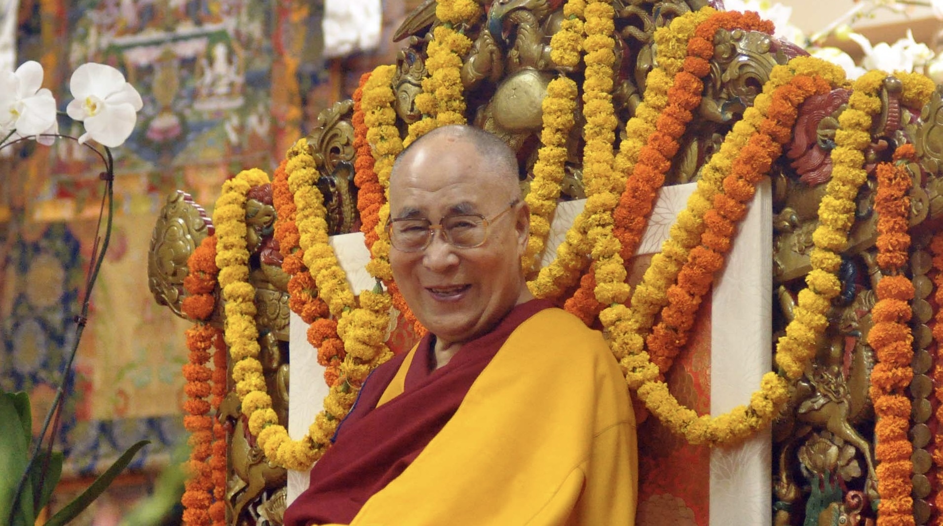 Tibetan Leader Says Dalai Lama Is 'Beyond The Sensoiral Pleasures' In Response To Tongue-Sucking Controversy