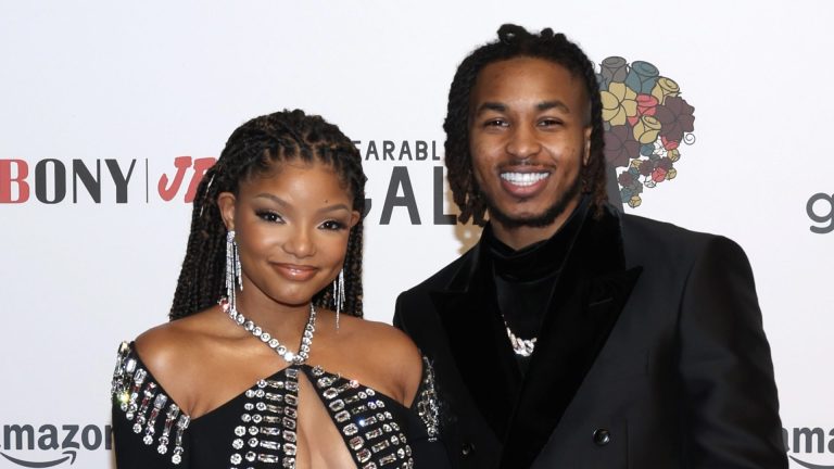 SANTA MONICA, CALIFORNIA - OCTOBER 22: Halle Bailey and DDG attend the 5th Annual WACO Wearable Art Gala at Barker Hangar on October 22, 2022 in Santa Monica, California.