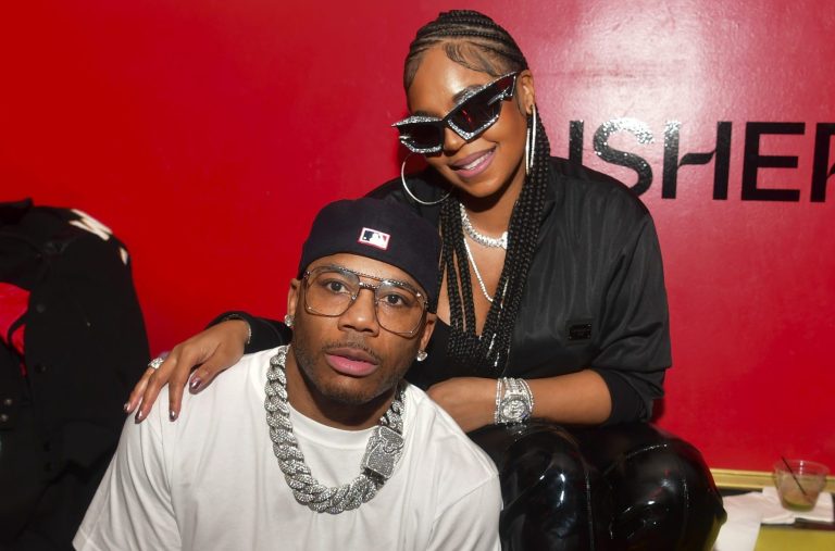 ATLANTA, GEORGIA - FEBRUARY 14: (EDITOR’S NOTE: Image created using a star filter) Nelly and Ashanti attend Usher's "Coming Home" Album Release Event on February 14, 2024 in Atlanta, Georgia.