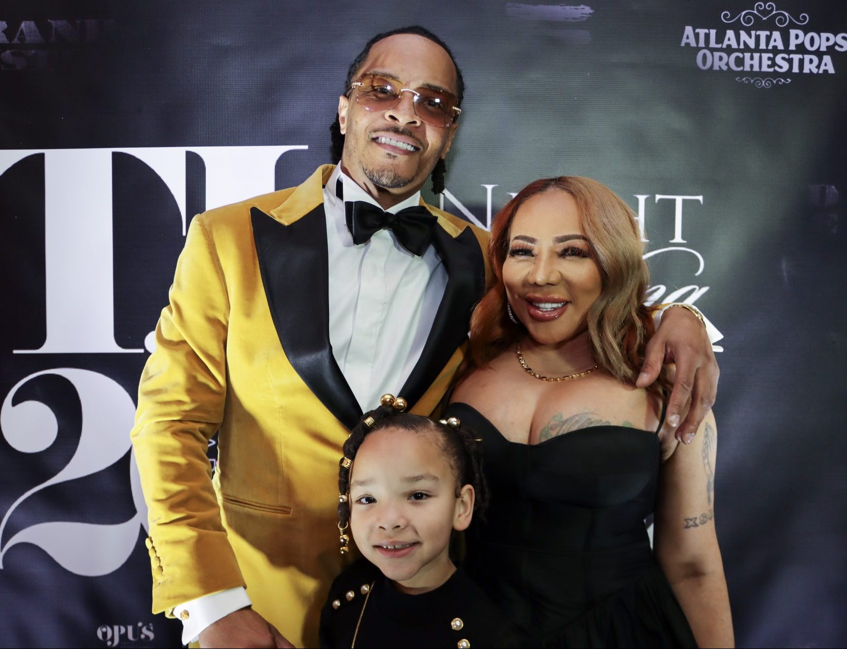 ATLANTA, GEORGIA - DECEMBER 28: T.I., Tameka Tiny Harris and Heiress Harris attend a night celebrating 20 years of Trap Muzik with The Atlanta Symphony Orchestra at Atlanta Symphony Hall on December 28, 2023 in Atlanta, Georgia.