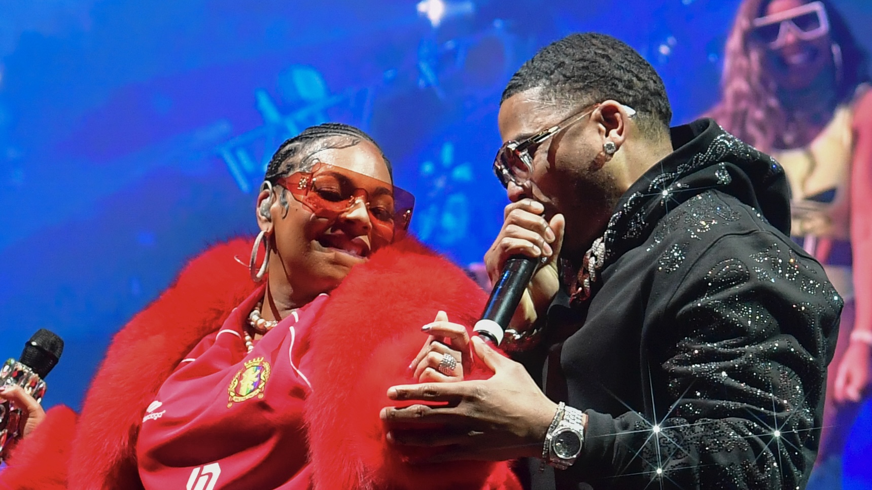 ATLANTA, GEORGIA - FEBRUARY 13: (EDITOR’S NOTE: Image created using a star filter) Ashanti and Nelly perform during Tycoon Music Festival at State Farm Arena on February 13, 2024 in Atlanta, Georgia.