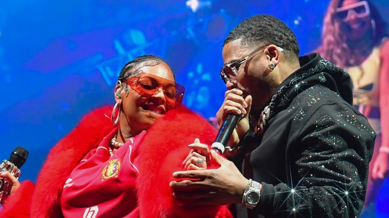 ATLANTA, GEORGIA - FEBRUARY 13: (EDITOR’S NOTE: Image created using a star filter) Ashanti and Nelly perform during Tycoon Music Festival at State Farm Arena on February 13, 2024 in Atlanta, Georgia.