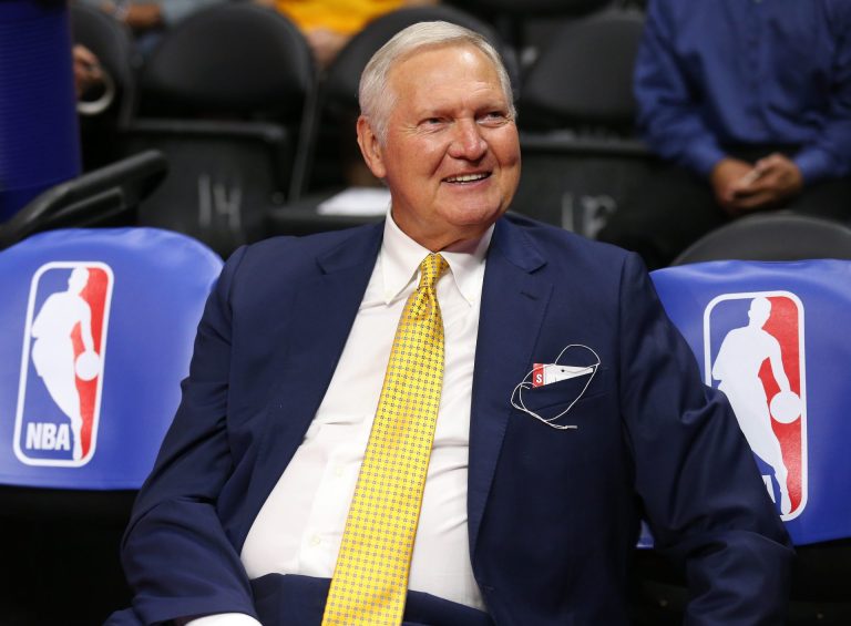 LOS ANGELES, CA - MARCH 31: Golden State Warriors executive board member Jerry West sits on the bench by NBA logos before the game the Los Angeles Clippers at Staples Center on March 31, 2015 in Los Angeles, California.